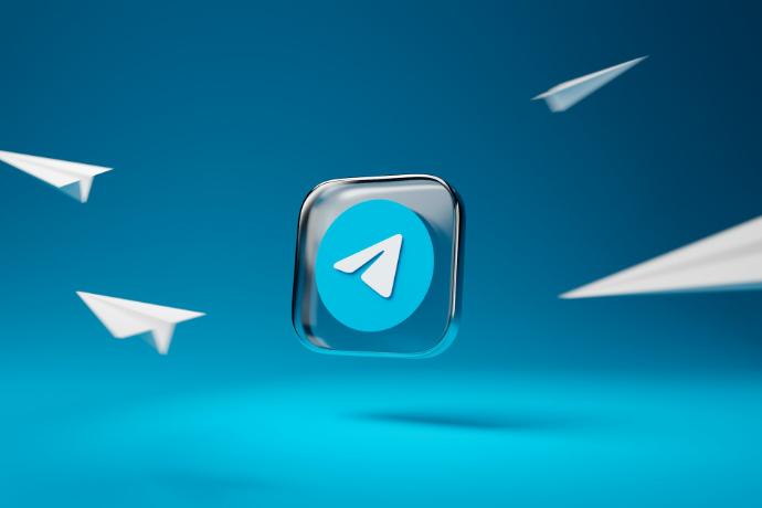 Gallery Image 04 a blue button with a white arrow on it